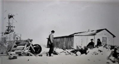 People outside of a house working