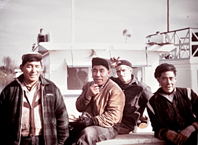 Cree and a non-Cree men in front of a schooner